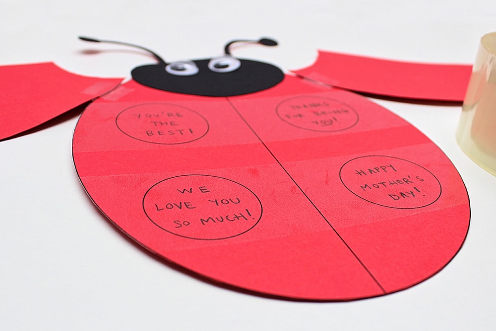 Messages on the ladybug's dots, covered with clear packing tape.