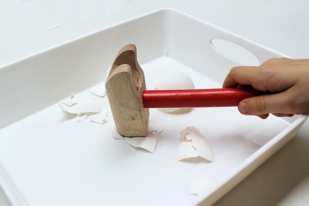 Let toddlers smash egg shells with hammers.