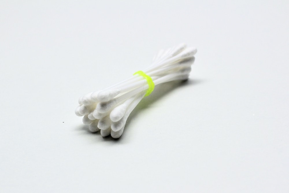 Q-tips bundled using a small elastic.