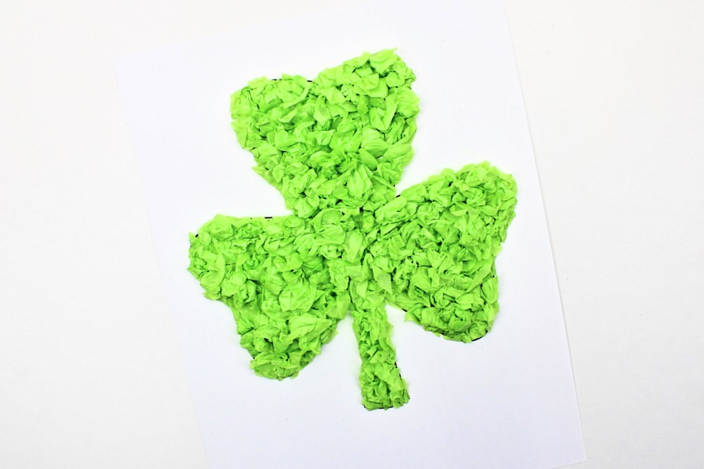 Shamrock shape made from crumpled green tissue paper.