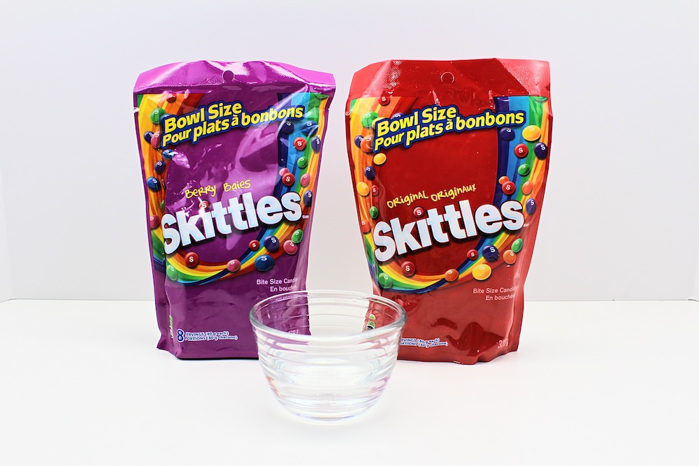 Supplies to do the rainbow Skittles experiment.