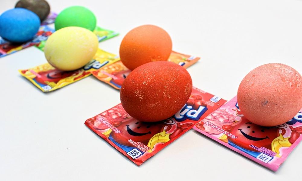 Kool-Aid dyed Easter eggs on Kool-Aid packets
