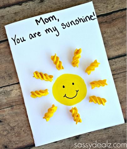 "You are my sunshine" card with yellow sun with pasta noodles rays of sunshine all around.