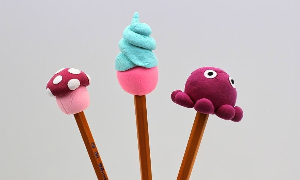 Cute DIY air dry clay pencil toppers on pencils