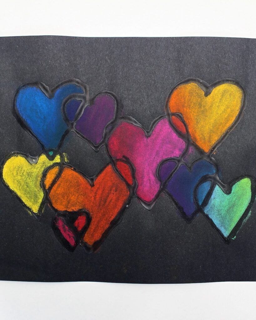 Finished chalk pastel overlapping heart craft.