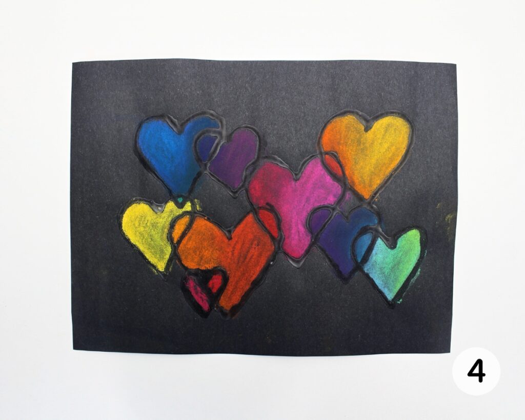 Chalk pastel colors blended together inside the glue hearts.