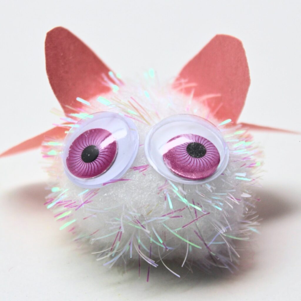 Love bug craft made from a pom-pom.