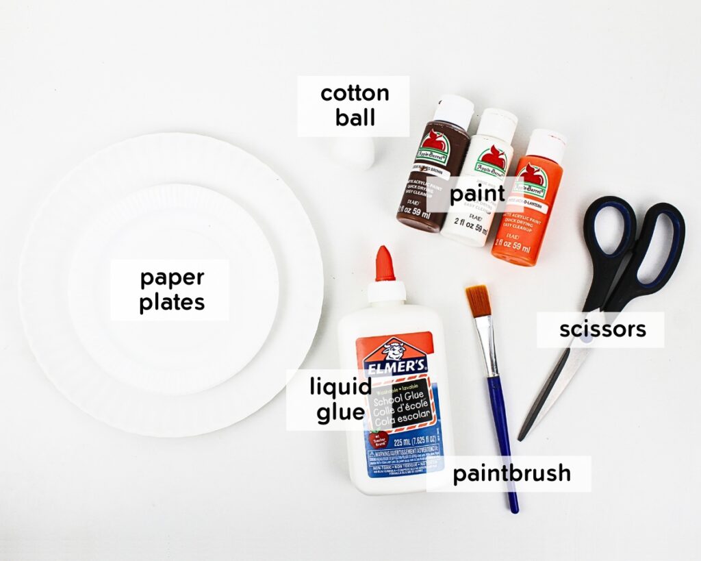 Supplies to make a paper plate pumpkin pie craft.