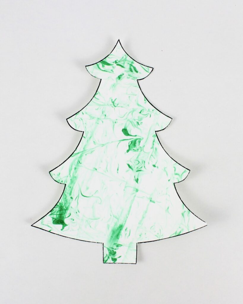 Christmas tree craft with marbled patterns.