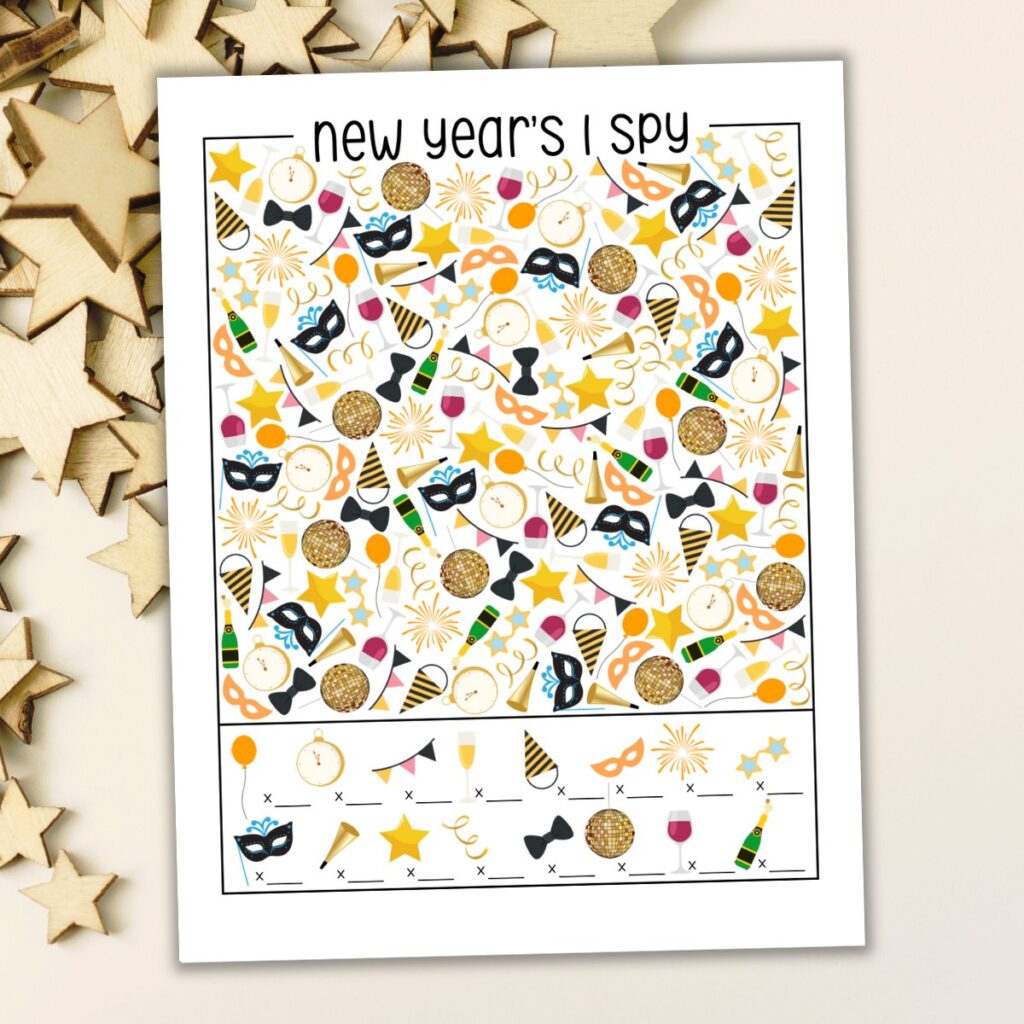 Mockup of New Year's I Spy printable on realistic background.