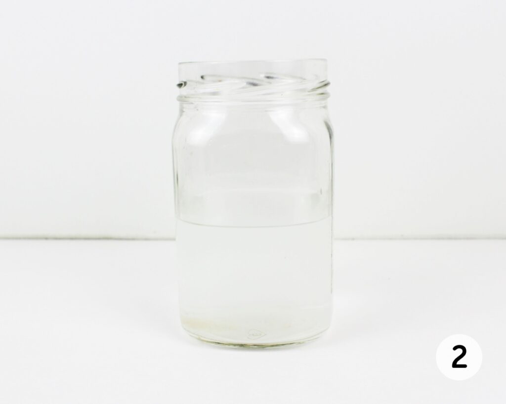 Jar filled with water.