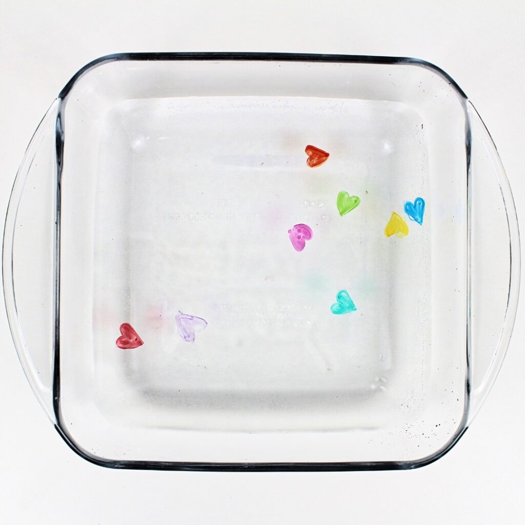 Heart drawings floating in water.