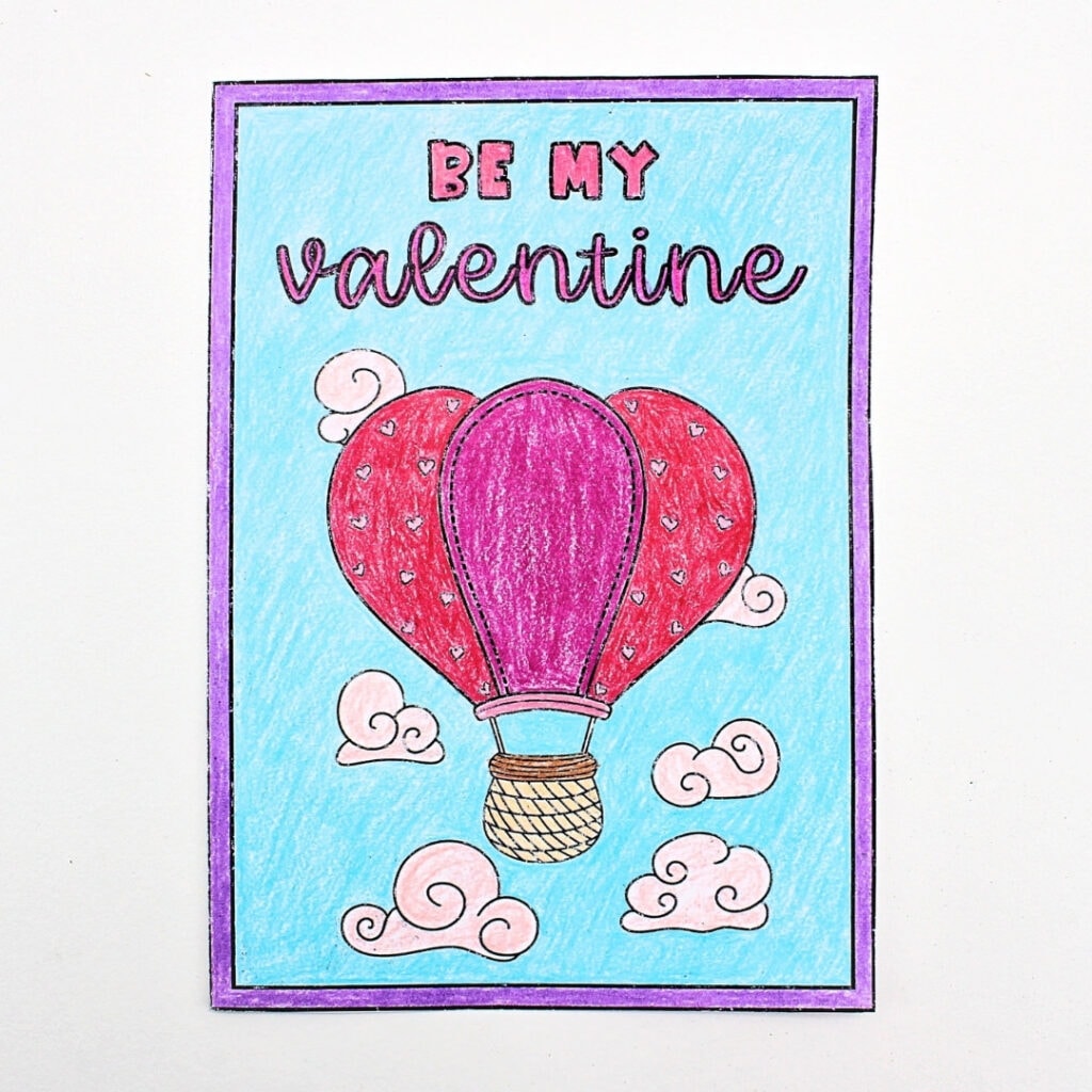 Valentine's Day card colored in with wooden pencils.
