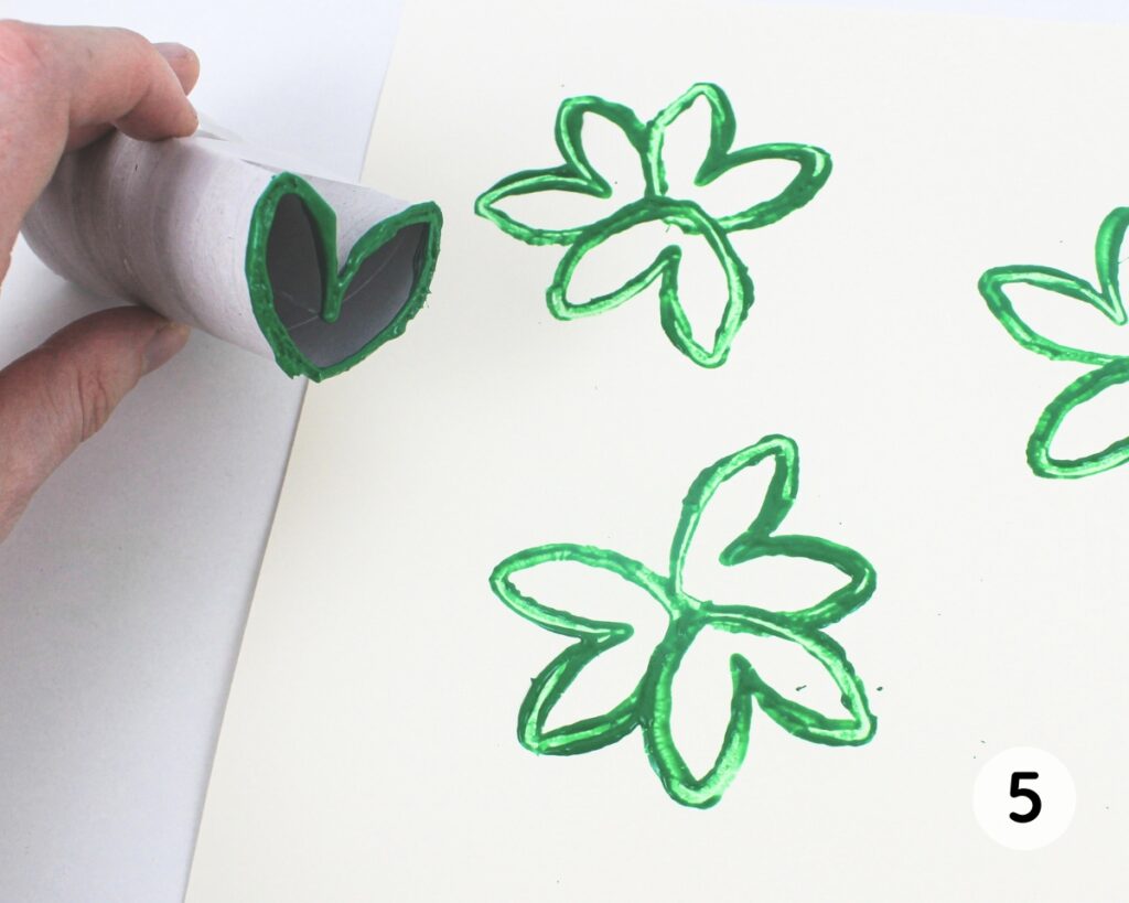 3 heart stamps joined together to create shamrocks.
