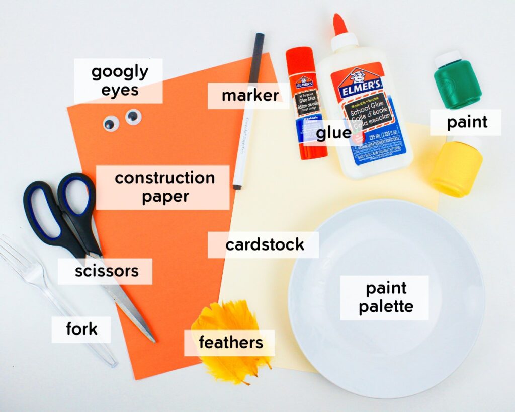 Supplies to make a fork painted Easter chick.